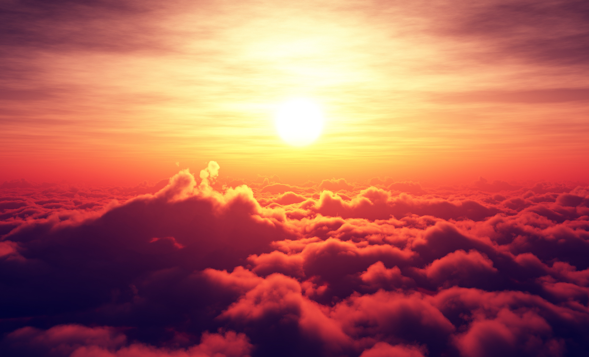 Sunrise above clouds